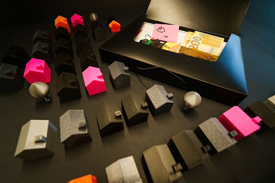 Estate planning documents and asset list on a desk